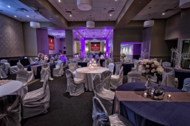 Ornately decorated Wedding at the Red Oak Ballroom in Fort Worth, Sundance Square. Specialty table overlays, chair covers with ties, runners, and custom centerpieces Fabulously decorated Wedding at the Red Oak Ballroom in Fort Worth, Sundance Square