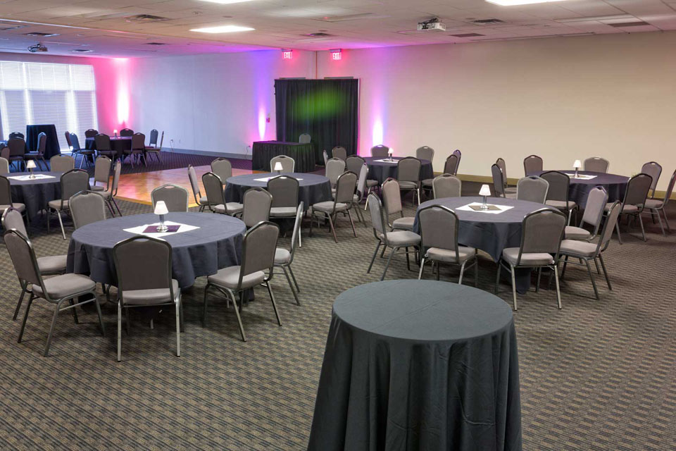 Setup of Rounds with Uplighting, Special Celebration at the Norris Centers in Austin