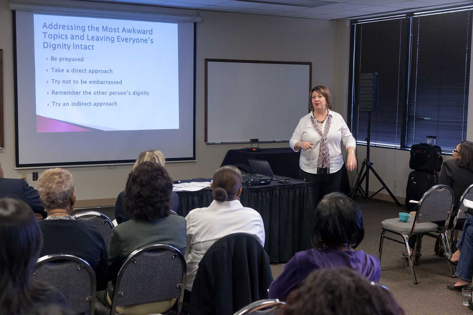 Norris Centers Houston Westchase Cypress Room during a presentation