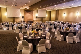 View of Dinner Setup in Black and White with Scuba Chair Covers, at the Norris Centers in Austin View of Dinner Setup in Black and White with Scuba Chair Covers, at the Norris Centers in Austin