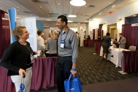 Attendees enjoying a booth at an Expo, Norris Centers, Houston CityCentre Attendees enjoying a booth at an Expo, Norris Centers, Houston CityCentre
