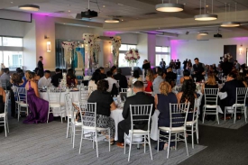 Chiavari Chairs and Stage with Columns, Wedding at the Red Oak Ballroom Houston/CityCentre